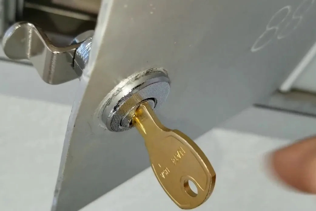 Locksmith changing mailbox lock on community cluster unit in South Florida HOA