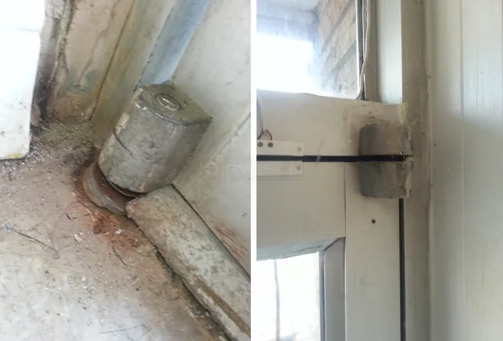 Triton Locksmith repairing Rixson floor closer pivot on commercial glass door