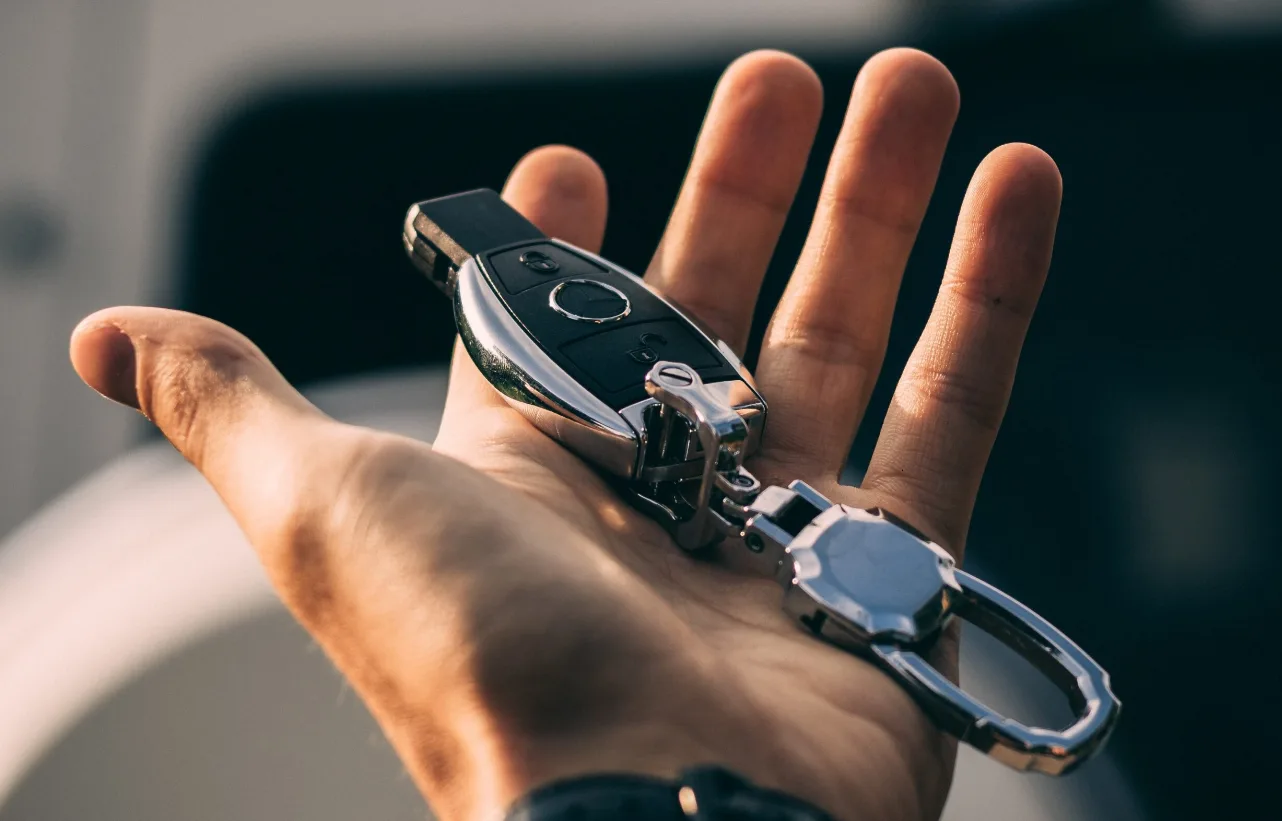 Mercedes-Benz chrome smart key KEYLESS-GO fob replacement by Triton Locksmith South Florida