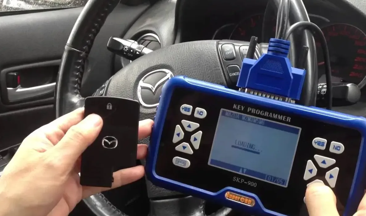 Triton Locksmith programming transponder key using diagnostic equipment