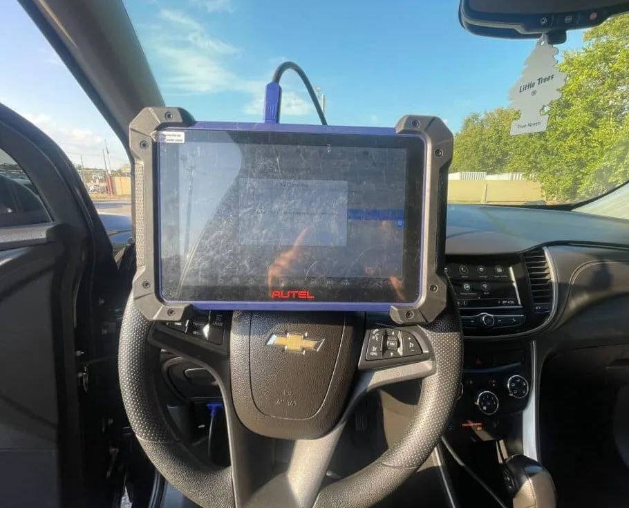 Autel IM608 Pro diagnostic tool programming car key fob through OBD-II port